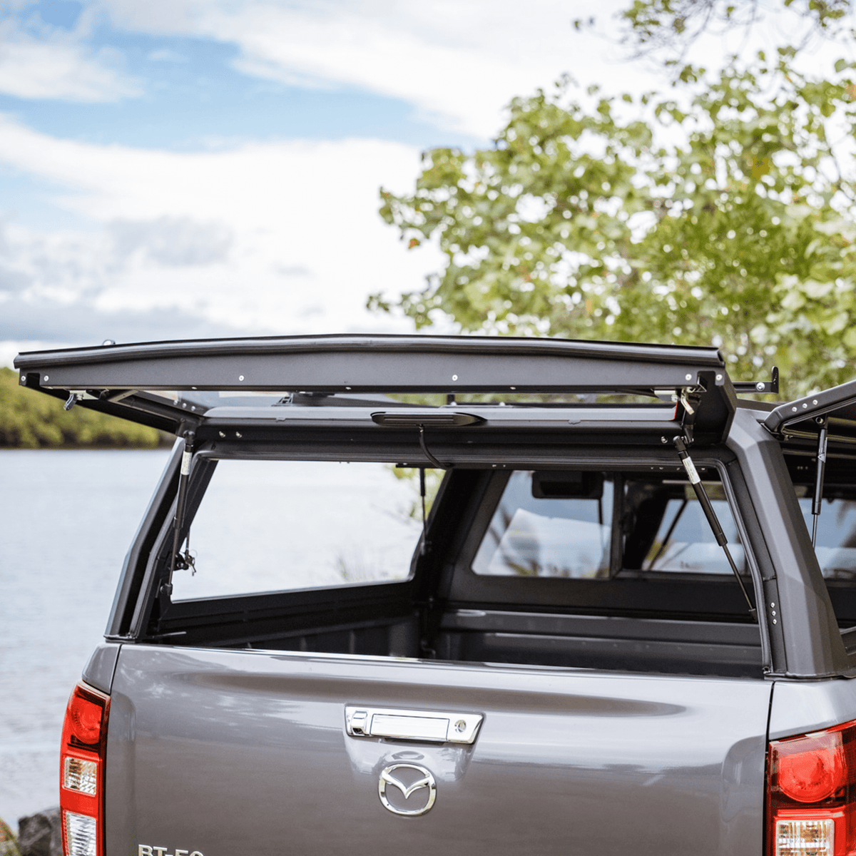 Black Xpedition canopy on a Mazda BT-50 2021+ with the rear door up