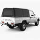 LandCruiser 70 Series single cab fitted with a black CapRax Xpedition canopy