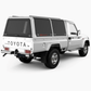 LandCruiser 70 Series single cab with a white-frame, black-door Xpedition canopy